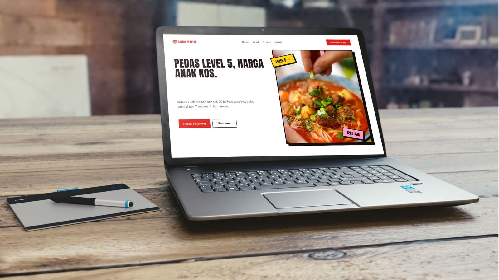 Website konsep Seblak Nyonyor di laptop